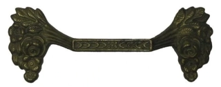 Madlo č.28, odlitek z mosazi 46×128 mm